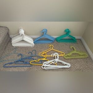 Lot of 66 white, yellow, green & blue mixed type toddler / little kid hangers